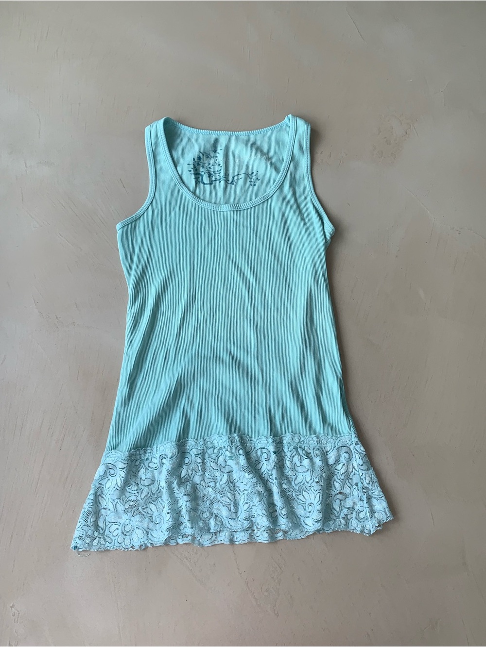 Teal babydoll tank top with lace trim 
Super cute for layering